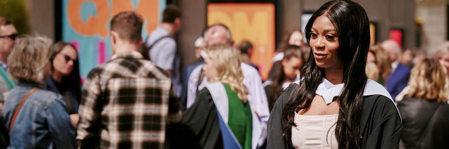 Female student at graduation outside Usher Hall