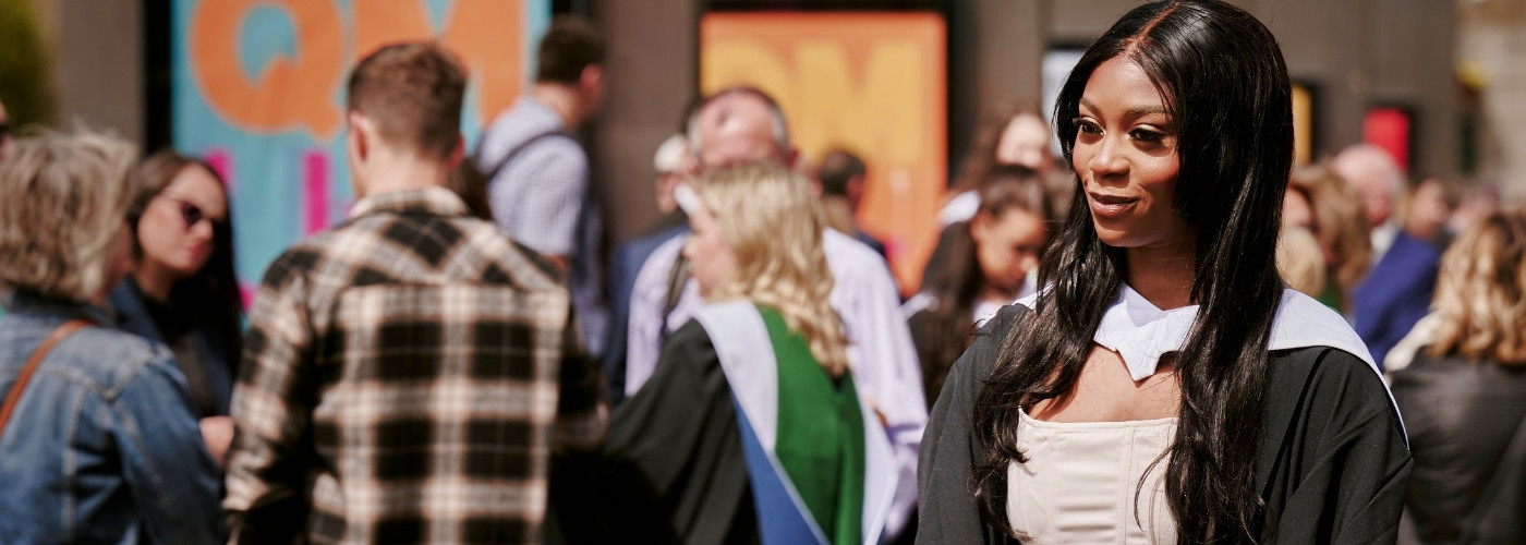 Female student at graduation outside Usher Hall