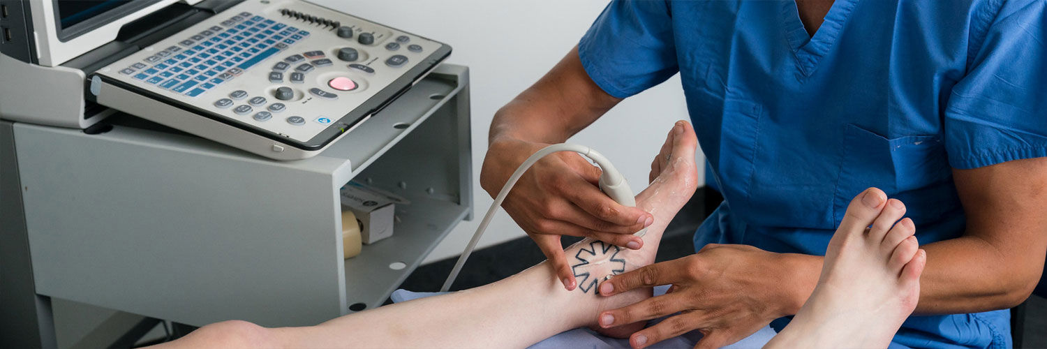 A close up of someone receiving podiatry treatment.