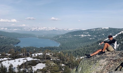 Image of Ignas sitting at view point