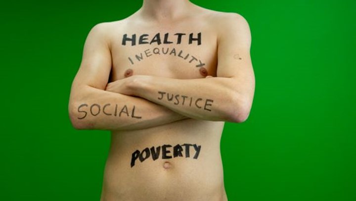 Social justice torso with words written on the skin