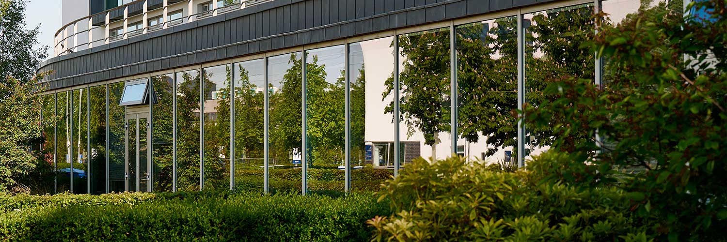 Exterior shot of the QMU campus building.