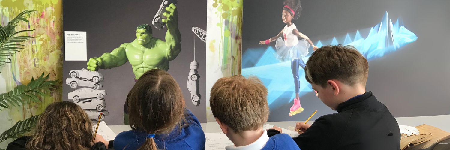 Four school children looking at the Toy Like Me disability resources