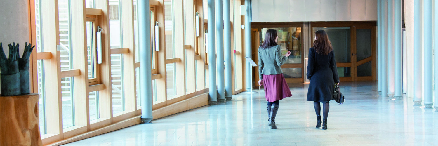 Women walking down corridor in Scottish parliament building
