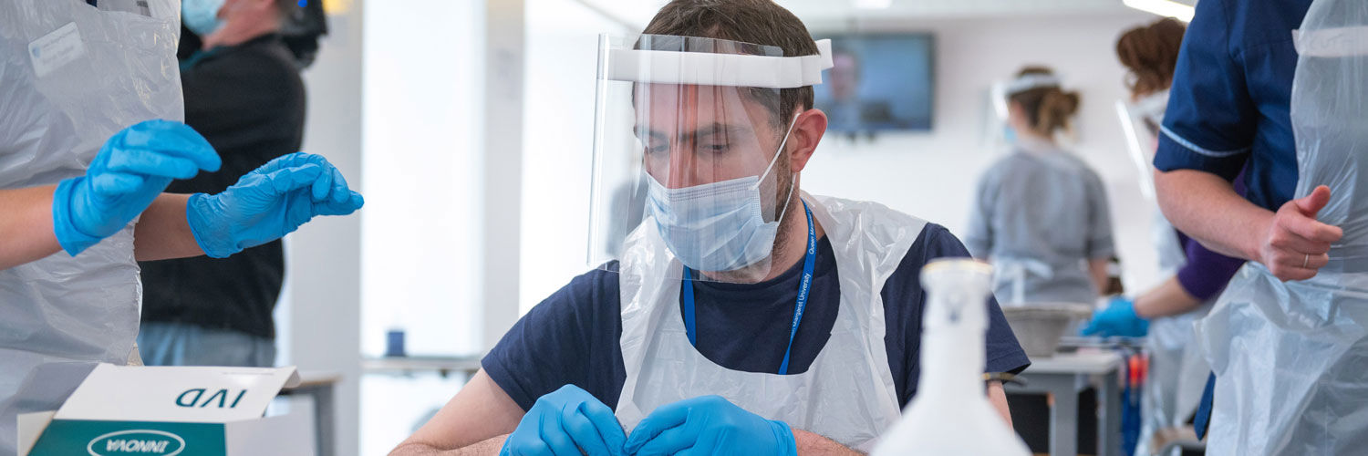 Medical staff wearing PPE at Covid-19 testing site