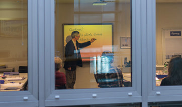 A class in session, photographed from outside at QMU campus