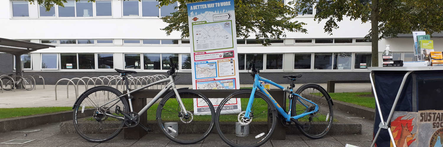 Two hires bikes on the QMU campus
