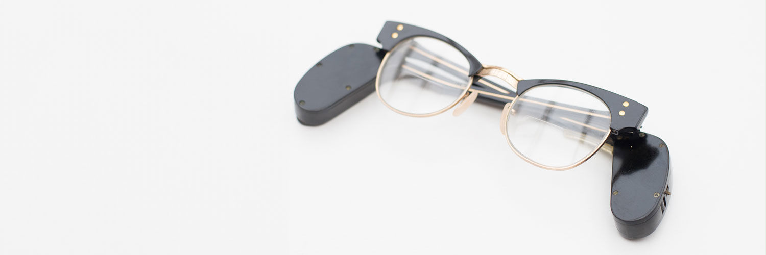 A piece of hearing aid apparatus, photographed as part of the Hearing Aid Technology showcase.