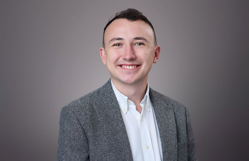 Photo of graduate Adrian Crighton