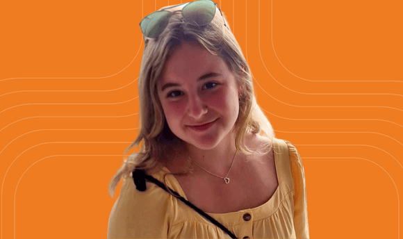 Photo of student Emese Toth with an orange background