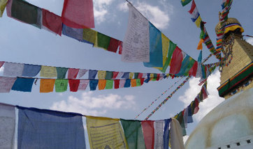 Rows and rows of prayer flags in every colour