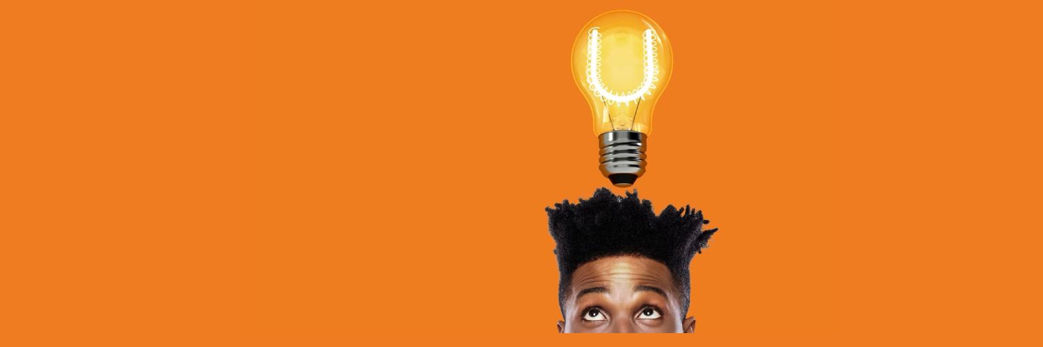 Young male with lightbulb shining above his head