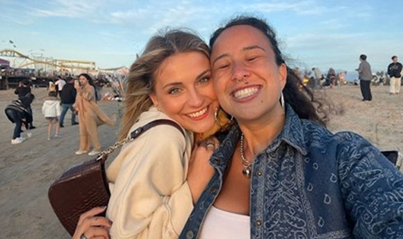 Two women pose for a selfie together