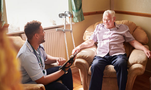 Nurse and elderly man