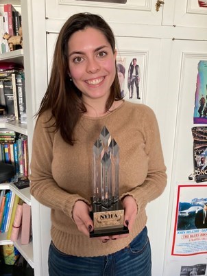 Photograph Margherita Mazza with her New York International Film Awards trophy