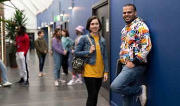 QMU students waiting outside lecture theatre and seminar rooms on campus