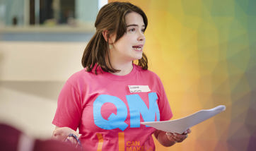 Female student conducting a campus tour