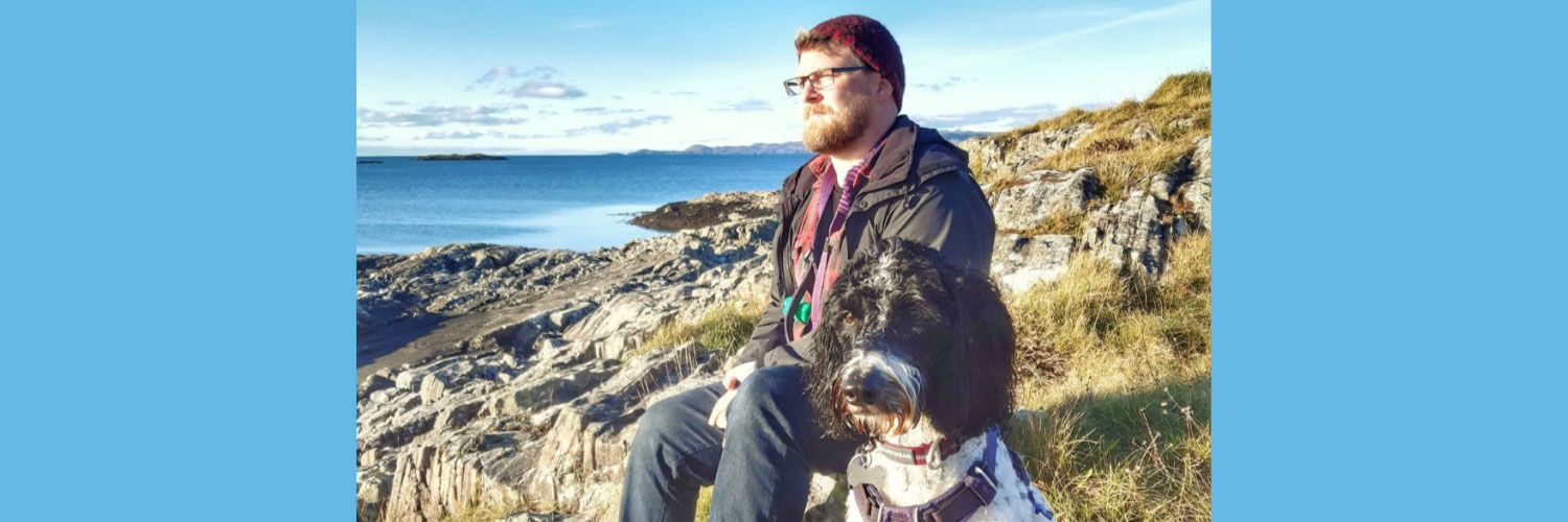 An image showing QMU lecturer Karl Johnson and his dog, Morag.