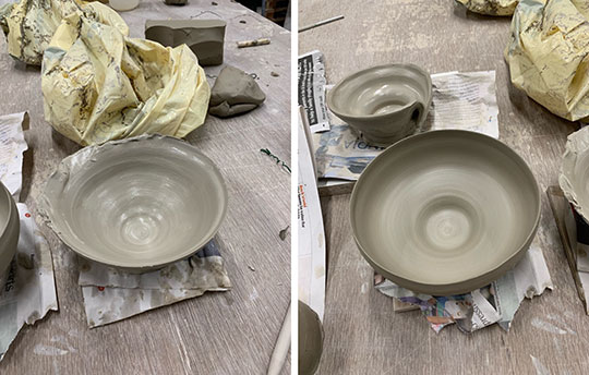 Two handmade pottery bowls - one incomplete and one complete.