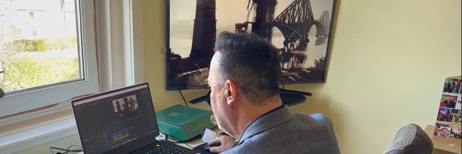 Walid Salah sits at a computer desk.