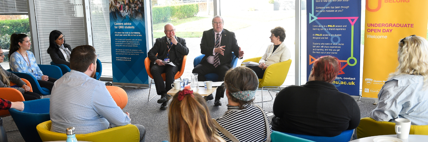 Principal Sir Paul Grice, Minister Graeme Dey and QMU students